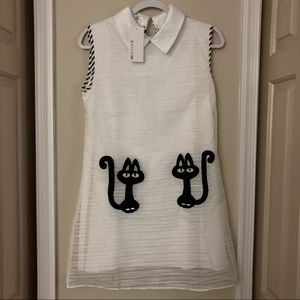 White dress with cat design